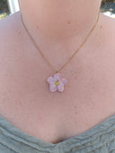 pendentif petite fleur rose
