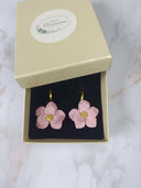 paire de petite fleurs rose