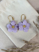 paire de petites fleurs lila
